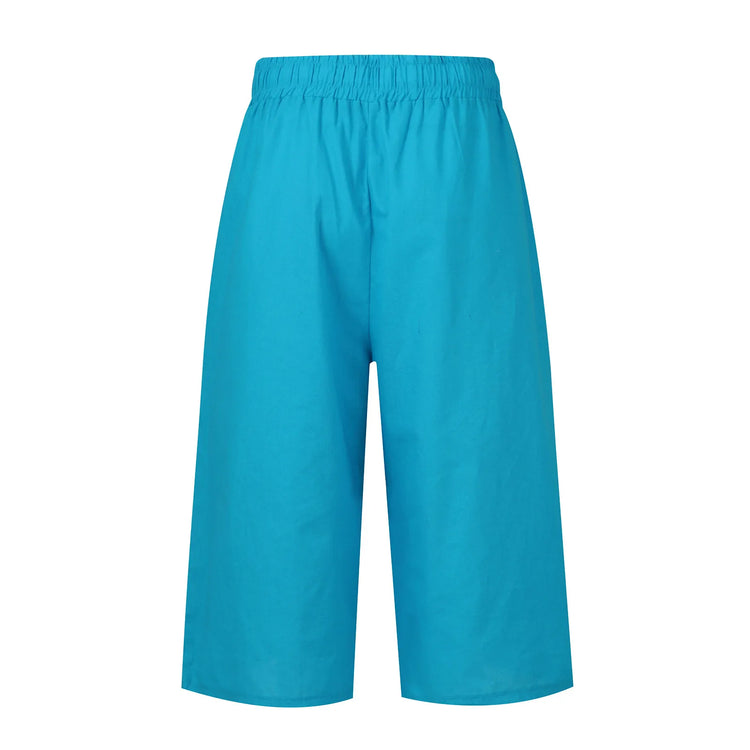 Turquoise pants on a white background