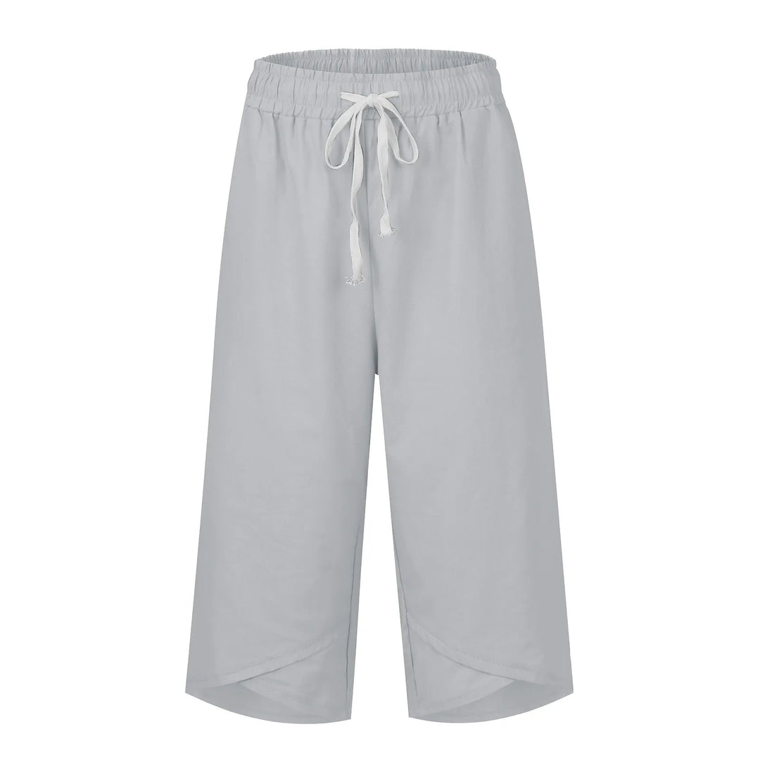 Light gray wide-leg pants with a drawstring on a white background