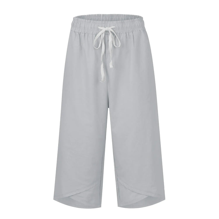 Light gray wide-leg pants with a drawstring on a white background