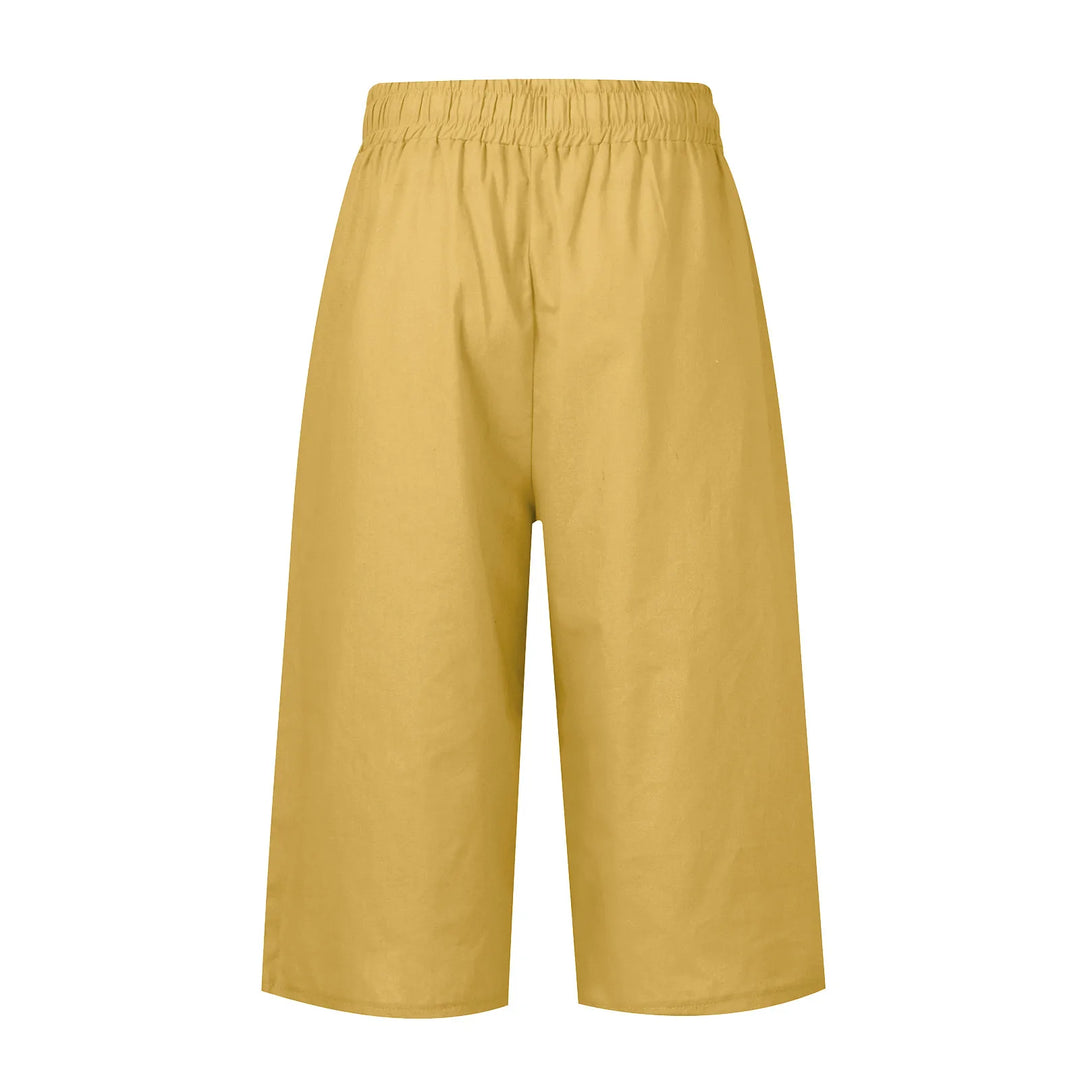 Mustard yellow pants on a white background