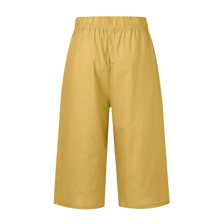 Mustard yellow pants on a white background