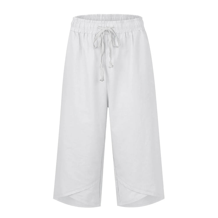 White wide-leg pants with a drawstring on a white background