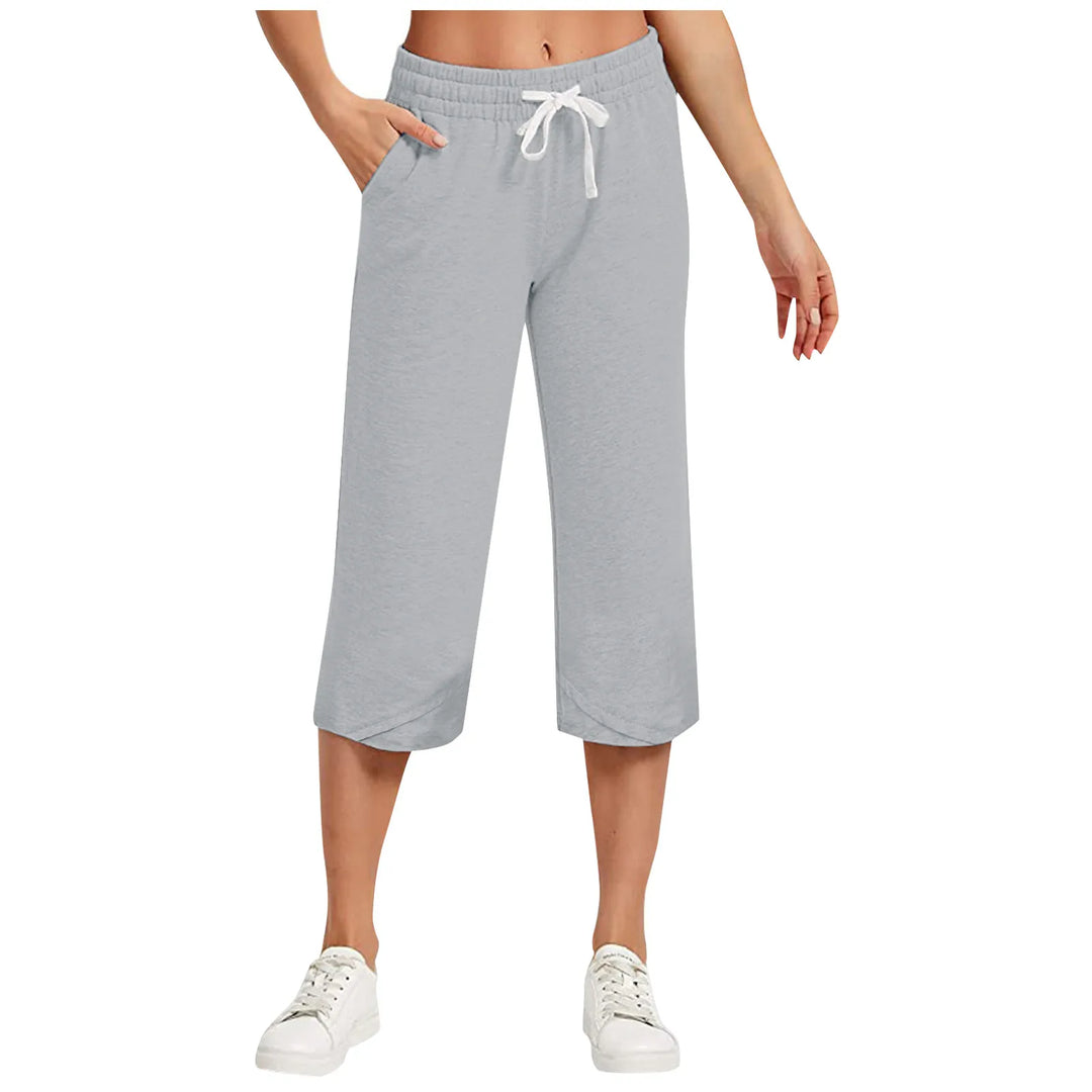 Gray capri pants with a drawstring on a white background