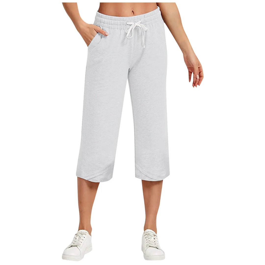 Light gray capri pants worn by a person on a white background