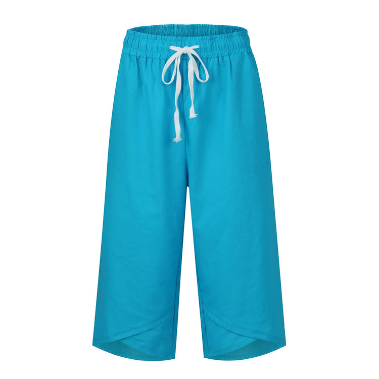 Turquoise pants with a drawstring on a white background